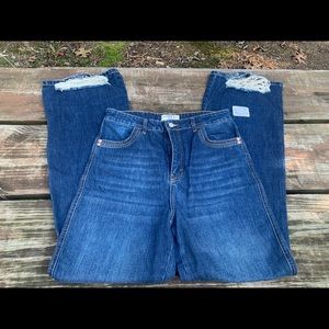 NWT Free People bootleg distressed blue jeans.